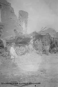 Little boy in front of destroyed buildings and machinery