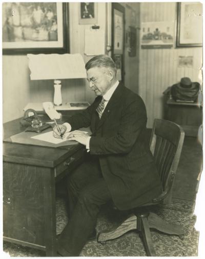 H.L. Clarke in office at L.B. (old Auditorium)