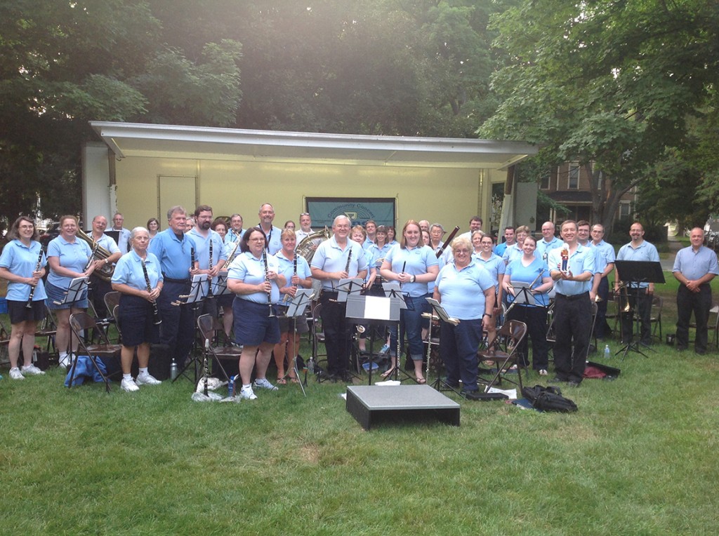Flat Sousa with the Bloomington-Normal, Illinois Community Band on July 31, 2014. He is held by the band's director, Michael Wallace, who has lead the ensemble since 1988.